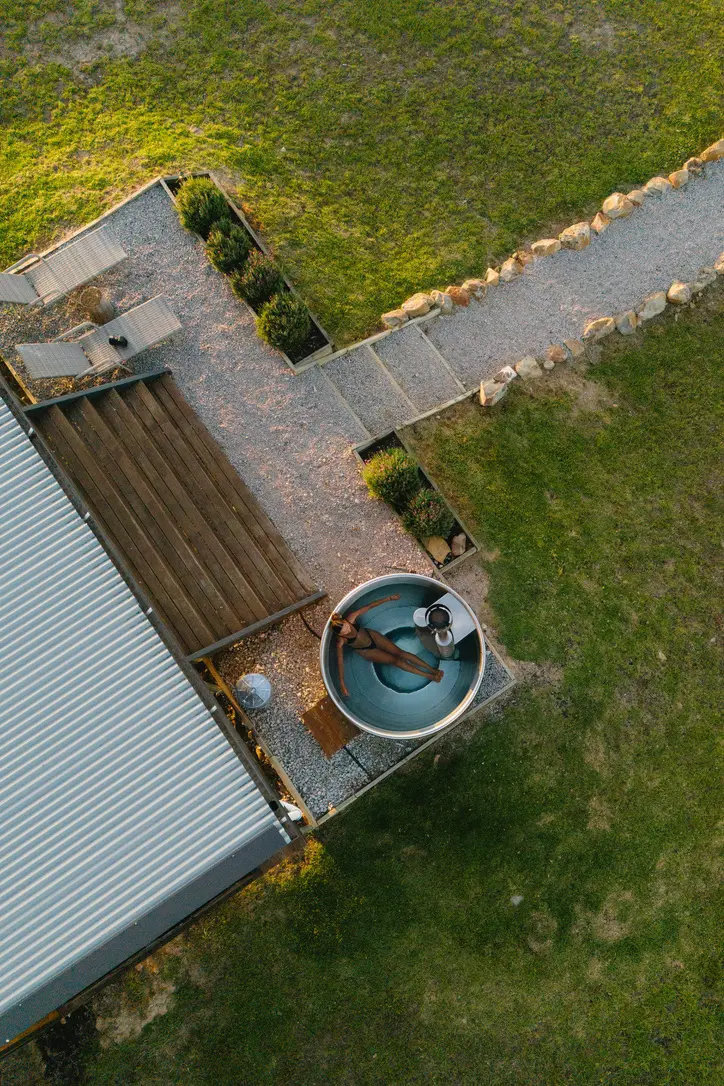 Aerial view of poolside patio and spa